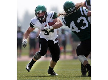 U of S Huskies' Colton Klassen runs with the ball during second half action to close out their spring camp at Griffith's Stadium on May 8, 2016.