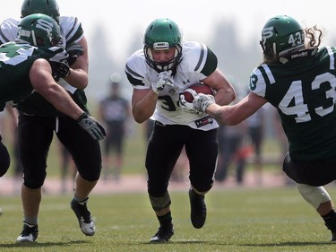 U of S Huskies' Colton Klassen runs with the ball during second half action to close out their spring camp at Griffith's Stadium on May 8, 2016.