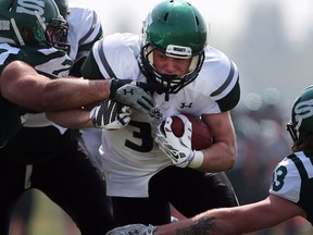 U of S Huskies' Colton Klassen runs with the ball during second half action to close out their spring camp at Griffith's Stadium on May 8, 2016.