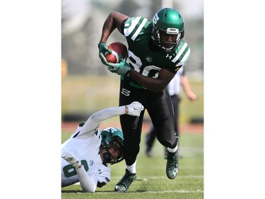 U of S Huskies receiver Julan Lynch runs with the ball during first half action to close out their spring camp at Griffith's Stadium on May 8, 2016.