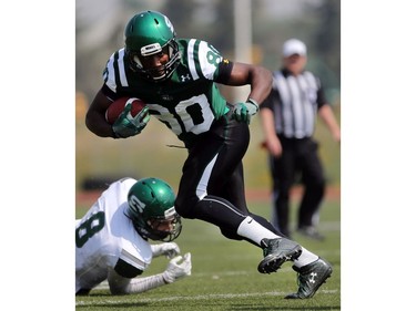 U of S Huskies receiver Julan Lynch runs with the ball during first half action to close out their spring camp at Griffith's Stadium on May 8, 2016.