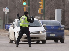 File photo of police traffic units conducting school zone speed enforcement.