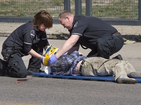 MD Ambulance responders at the scene of a crash involving an elderly male at Central Avenue and 109th Street on May 4, 2016.