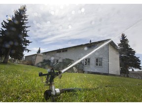 A water sprinkler runs on the east side of Saskatoon, Thursday, May 05, 2016.