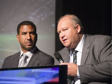 Huskies head coach Brian Towriss (R) with CFL on TSN analyst Jock Climie on stage during the annual Huskies Dog's Breakfast event at Prairieland Park, May 5, 2016.