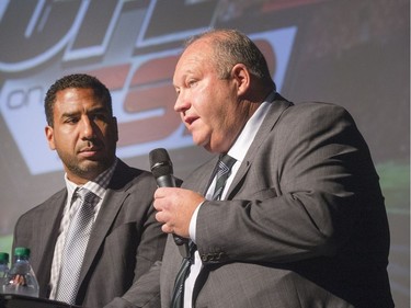 Huskies head coach Brian Towriss, right, with  CFL on TSN analyst Jock Climie on stage during the annual Huskies Dog's Breakfast event at Prairieland Park, May 5, 2016.