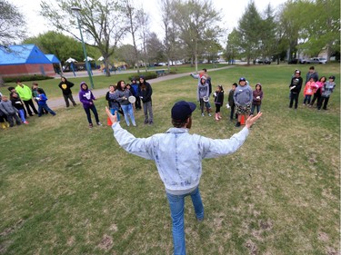 SUM Theatre kicked off its Theatre in the Park season with a fun relay event in Thornton Park involving school kids from St. Frances school, May 12, 2016. The event was in celebration of the new production called Little Badger and The Fire Spirit. Here Sum Director Joel Bernbaum motivates students in the piggyback race.