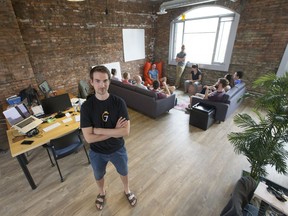 Jordan Boesch, CEO of 7Shifts, with colleagues inside their downtown office, Tuesday, May 17, 2016.