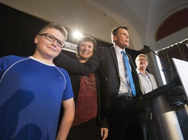 Charlie Clark, with son Simon, wife Sarah Buhler and mother Jane Ritchie, announced his bid for mayor during a packed event at the Bessborough Hotel, May 18, 2016.