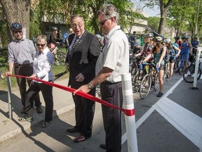 A crowd of riders attended the grand opening of the new 4th Avenue Protected Bike Lanes at city hall, Thursday, May 19, 2016.