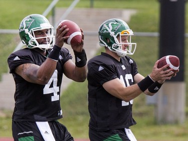 Quarterbacks Darian Durant (L) and  Brett Smith during Saskatchewan Roughriders training camp at Griffiths Stadium, May 30, 2016.