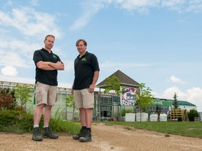 Steve (left) and Colin (right) Wilson of Wilson's Greenhouse pose for a photo on May 26, 2016.