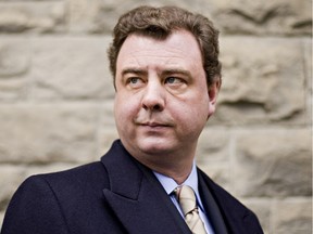 George Dryden poses for a portrait outside Toronto's Church of the Redeemer, Tuesday afternoon, January 4, 2011. Dryden, who was raised by a prominent Liberal but who believes he is the son of former Prime Minister John Diefenbaker.