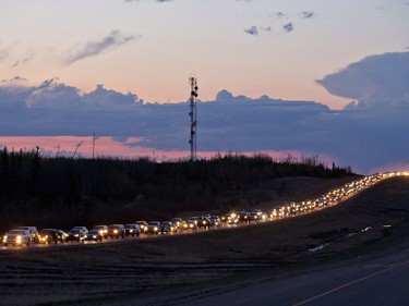 Traffic lines the highway as residents leave Fort McMurray, Alberta, May 3, 2016. A wildfire has put all of Fort McMurray under a mandatory evacuation order which means that about 70,000 people who live in Fort McMurray are being told to flee the city.