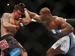 Frank Mir, left, and Alistair Overeem, of the Netherlands, fight during the second round of a UFC 169 heavyweight mixed martial arts bout in Newark, N.J., Saturday, Feb. 1, 2014. Overeem won by unanimous decision.