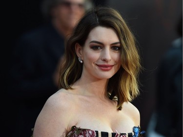 Acor Anne Hathaway attends the premiere of Disney's "Alice Through The Looking Glass," May 23, 2016 at the El Capitan Theatre in Hollywood, California.