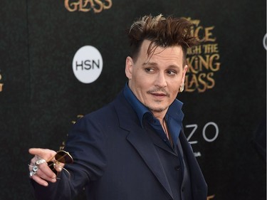 Actor Johnny Depp attends the premiere of Disney's "Alice Through The Looking Glass," May 23, 2016 at the El Capitan Theatre in Hollywood, California.