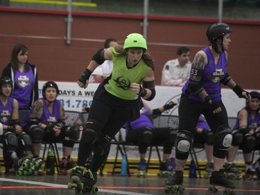 Pile O'Bones' The Gang Green during the Attack of the 8 Wheeled Woman Roller Derby Tournament in Warman, May 14, 2016.