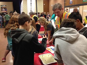 Ralf Maxeiner, with the Saskatchewan Geological Survey, leads Grade 7 student activities at MAP (Minerals and Products) 2015.