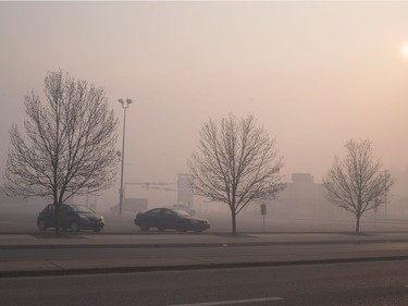 Smoke from wildfires fill the morning air on May 6, 2016 in Fort McMurray, Alberta. Wildfires, which are still burning out of control, have forced the evacuation of more than 80,000 residents from the town.
