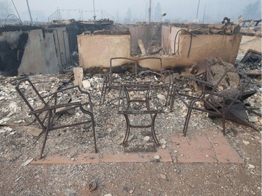 Home foundations and remains of possessions are nearly all that remain in a residential neighbourhood destroyed by a wildfire on May 6, 2016 in Fort McMurray, Alberta. Wildfires, which are still burning out of control, have forced the evacuation of more than 80,000 residents from the town.