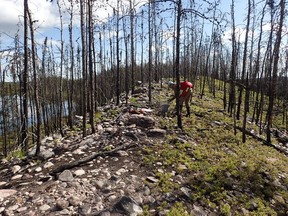 A De Beers Canada Inc. geologist collects samples on the 43,000-acre northern Saskatchewan property the diamond company is paying up to $20.4 million to explore.