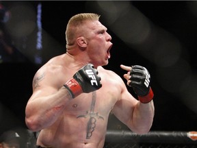 Brock Lesnar celebrates after defeating Frank Mir in their heavyweight title bout at UFC 100 at Mandalay Bay in Las Vegas Saturday, July 11, 2009.