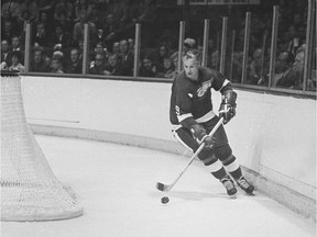 Gordie Howe of the Detroit Red Wings skates against the Montreal Canadiens in 1965 at the Montreal Forum in Montreal, Quebec.