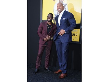 Kevin Hart (L) and Dwayne Johnson attend the LA premiere of "Central Intelligence" held at the Regency Village Theatre on June 10, 2016 in Los Angeles, California.