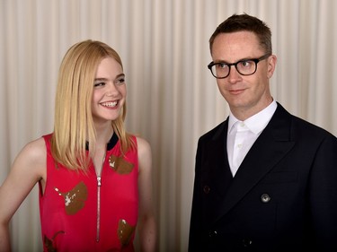 Actor Elle Fanning and director Nicolas Winding Refn pose to promote "The Neon Demon" in Los Angeles, California, June 15, 2016.