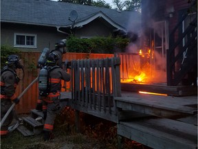 Firefighters work on a blaze at 128 8th Street East in Saskatoon on Friday, June 3, 2016. Crews got the fire under control in about 20 minutes. (Supplied/Saskatoon Fire Department)