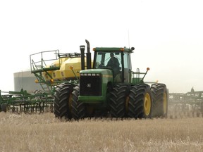 Craig McDougall seeding 600 acres with lentils on his farm west of Regina. Pulse crop development in Saskatchewan recently received a $23 million boost from a farmer-funded development organization.