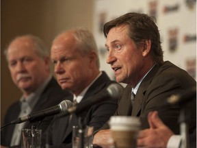 Marty Howe, left to right, Mark Howe, Wayne Gretzky and Bretty Hull speak during a media event before a tribute to Gordie Howe in Saskatoon, Friday, February 6, 2015.