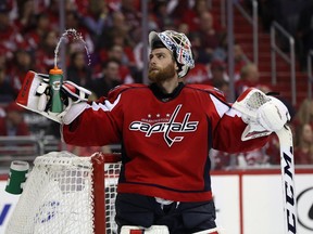 Goalie Braden Holtbyof the Washington Capitals gets a drink in the third period against the Philadelphia Flyers in Game Two of the Eastern Conference Quarterfinals during the 2016 NHL Stanley Cup Playoffs at Verizon Center on April 16, 2016 in Washington, DC.  The Capitals won 4-1.