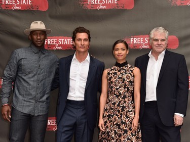 L-R: Actors Mahershala Ali, Matthew McConaughey, Gugu Mbatha-Raw and writer-director Garry Ross attend the photo call for STX Entertainment's "Free State of Jones" at Four Seasons Hotel Los Angeles at Beverly Hills on May 11, 2016 in Los Angeles, California.