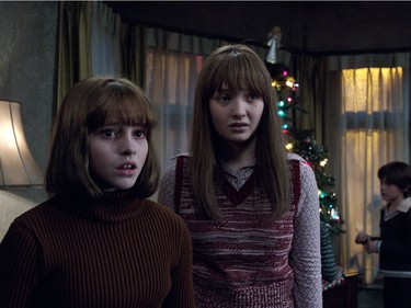 Madison Wolfe (L) and Lauren Esposito star in "The Conjuring 2."