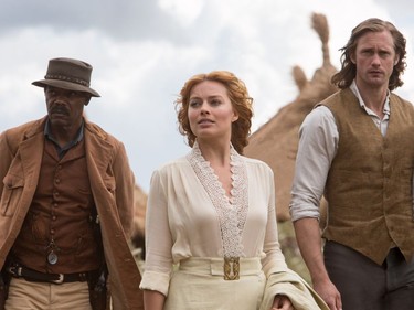 L-R: Samuel L. Jackson as George Washington Williams, Margot Robbie as Jane and Alexander Skarsgård as Tarzan in Warner Bros. Pictures' and Village Roadshow Pictures' action adventure "The Legend of Tarzan."