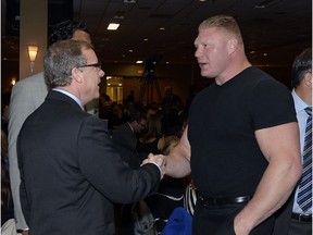 Premier Brad Wall meets former UFC heavyweight champion Brock Lesnar prior to delivering his State of the Province address at Evraz Place in Regina  on October 17, 2013.