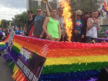 Revellers take part in Saskatoon's annual Pride Parade on June 11, 2016.