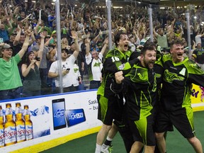 Saskatchewan Rush players and fans celebrate an 11-10 win over Buffalo, and a National Lacrosse League championship, Saturday night.