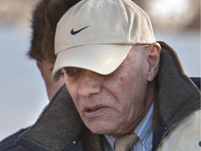 Paul Leroux exits Battleford's Court of Queen's Bench on Dec. 5 2013. (Gord Waldner/ Saskatoon StarPhoenix)