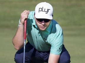 Saskatoon golfer Liam Courtney lines up a putt on the third hole while playing in the qualifier at the Willows for the 2016 Mackenzie-PGA Tour Canada Tour's SIGA Dakota Dunes Open. (GORD WALDNER/Saskatoon StarPhoenix)