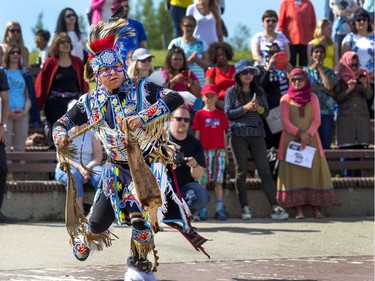 Indigenous dancers in the grand entry at the amphitheatre at Wanuskewin Heritage Park at the opening of the Aboriginal Day Celebration, June 21, 2016.