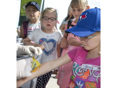 Fun and games along with food, park tours, crafts and body art at Wanuskewin Heritage Park at the opening of the Aboriginal Day Celebration, June 21, 2016.