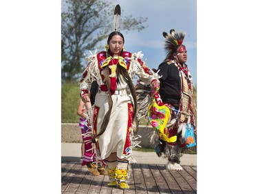 Indigenous dancers in the grand entry at the amphitheatre at Wanuskewin Heritage Park at the opening of the Aboriginal Day Celebration, June 21, 2016.