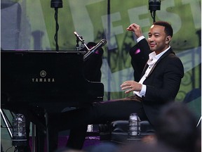 John Legend performs at the Bess Gardens during the Saskatoon Jazz Festival on June 22, 2014.