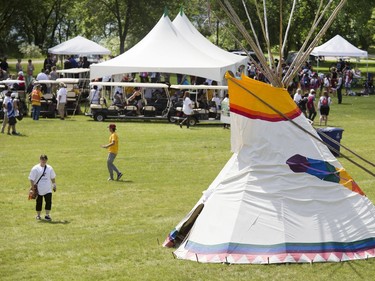 Thousands joined the "Rock Your Roots" Walk for Reconciliation at a Day of Reconciliation in Saskatoon, June 22, 2016. The walk began at Victoria Park and went past the 1812 statue, the Gabriel Dumont statue and the Chief Whitecap and John Lake statue before going through River Landing and finishing at the park along the Meewasin Trail.