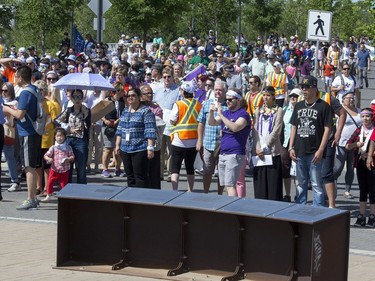 Thousands joined the "Rock Your Roots" Walk for Reconciliation at a Day of Reconciliation in Saskatoon, June 22, 2016. The walk began at Victoria Park and went past the 1812 statue, the Gabriel Dumont statue and the Chief Whitecap and John Lake statue before going through River Landing and finishing at the park along the Meewasin Trail.