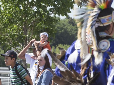 Thousands joined the "Rock Your Roots" Walk for Reconciliation at a Day of Reconciliation in Saskatoon, June 22, 2016. The walk began at Victoria Park and went past the 1812 statue, the Gabriel Dumont statue and the Chief Whitecap and John Lake statue before going through River Landing and finishing at the park along the Meewasin Trail.