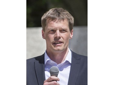 On behalf of the City of Saskatoon, Charlie Clark addressed the large crowd that attended the Pride Week flag raising at City Hall, June 6, 2016.